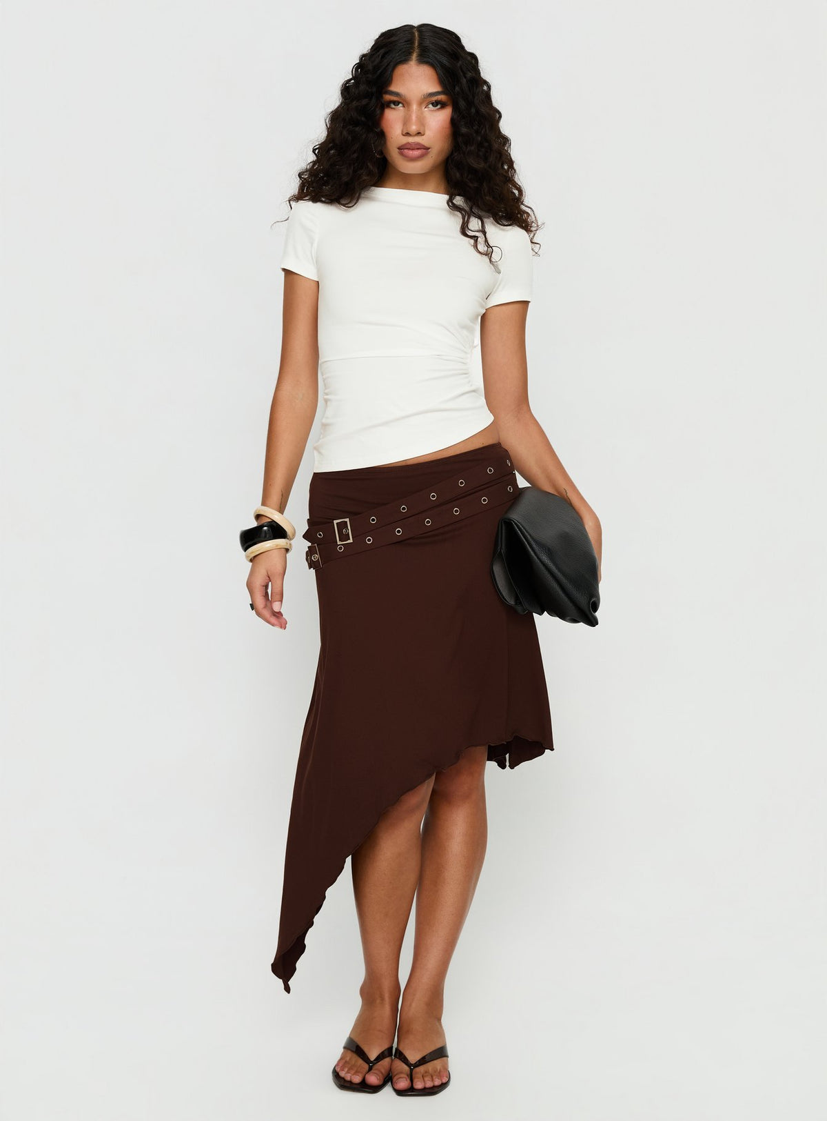 back view of model wearing Princess Polly Lorensa Double Buckle Asymmetrical Midi Skirt Brown Midi Skirts Skirts 
