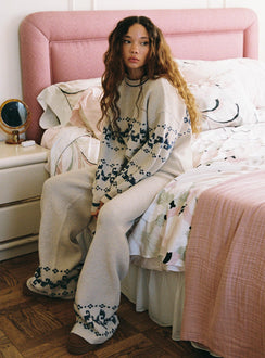 side view of model wearing Princess Polly Alpine Sweater Cream / Blue regular Jumpers 