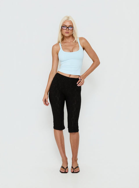 Showcasing the Samaira Capri Pant Black Anglaise in womens-regular-pants with high-rise front view of model wearing Princess Polly