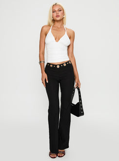 front view of model wearing Princess Polly True Grit Eyelet Flare Pants Black Low Rise Pants 