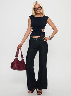 front view of model wearing Princess Polly Slow Ride Mid Rise Bootleg Belted Jeans Dark Indigo Blue Mid Rise Jeans Jeans 