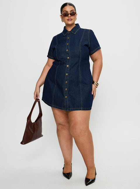 front view of model wearing Princess Polly Perception Denim Mini Dress Mid Wash Curve V-Neck 