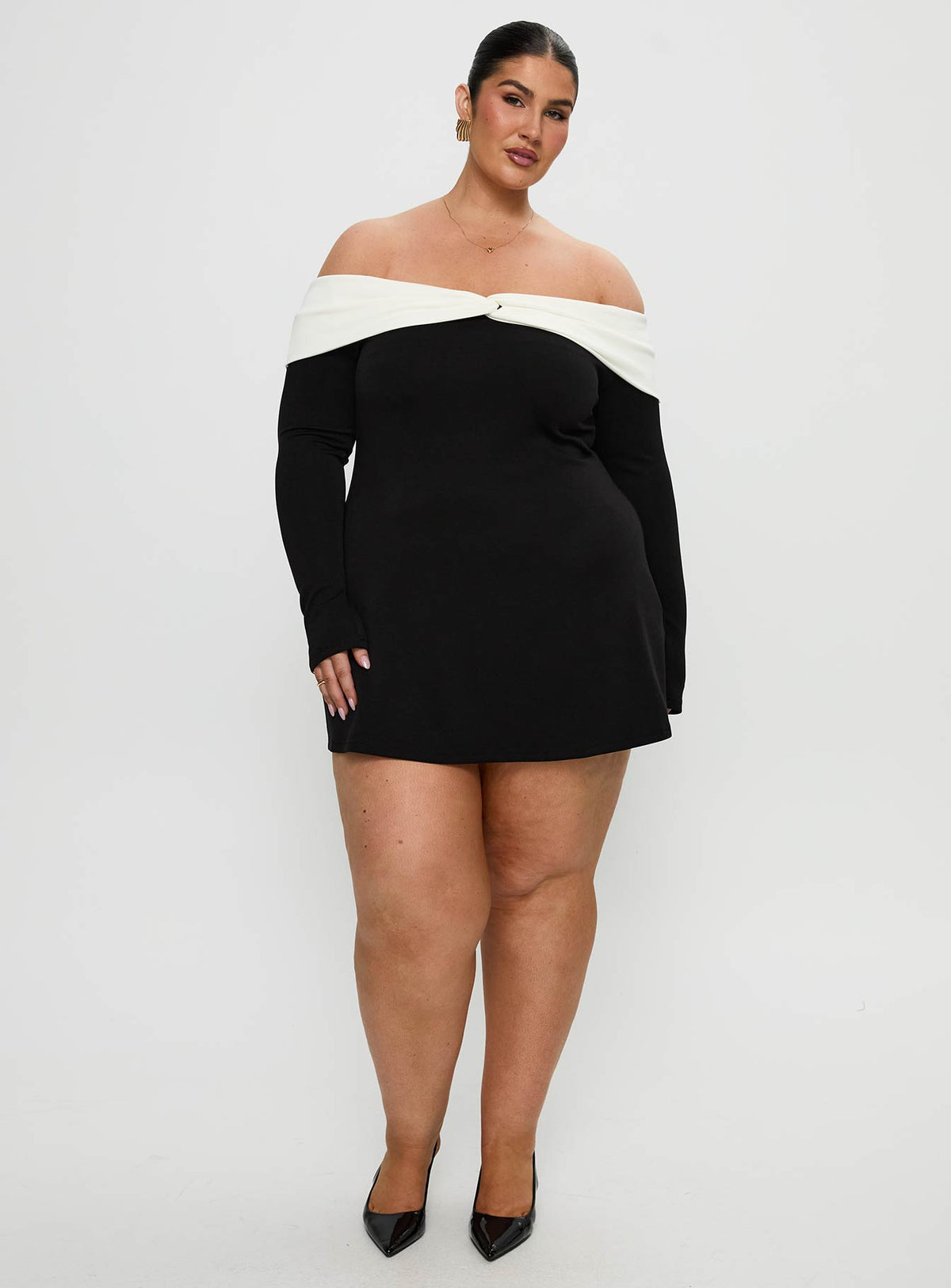 front view of model wearing Princess Polly Distractions Off The Shoulder Mini Dress Multi Curve High Neck 