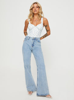 front view of model wearing Princess Polly Lupton Bodysuit White / Blue Floral Sleeveless Bodysuit 