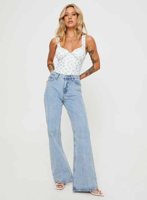 front view of model wearing Princess Polly Lupton Bodysuit White / Blue Floral Sleeveless Bodysuit 