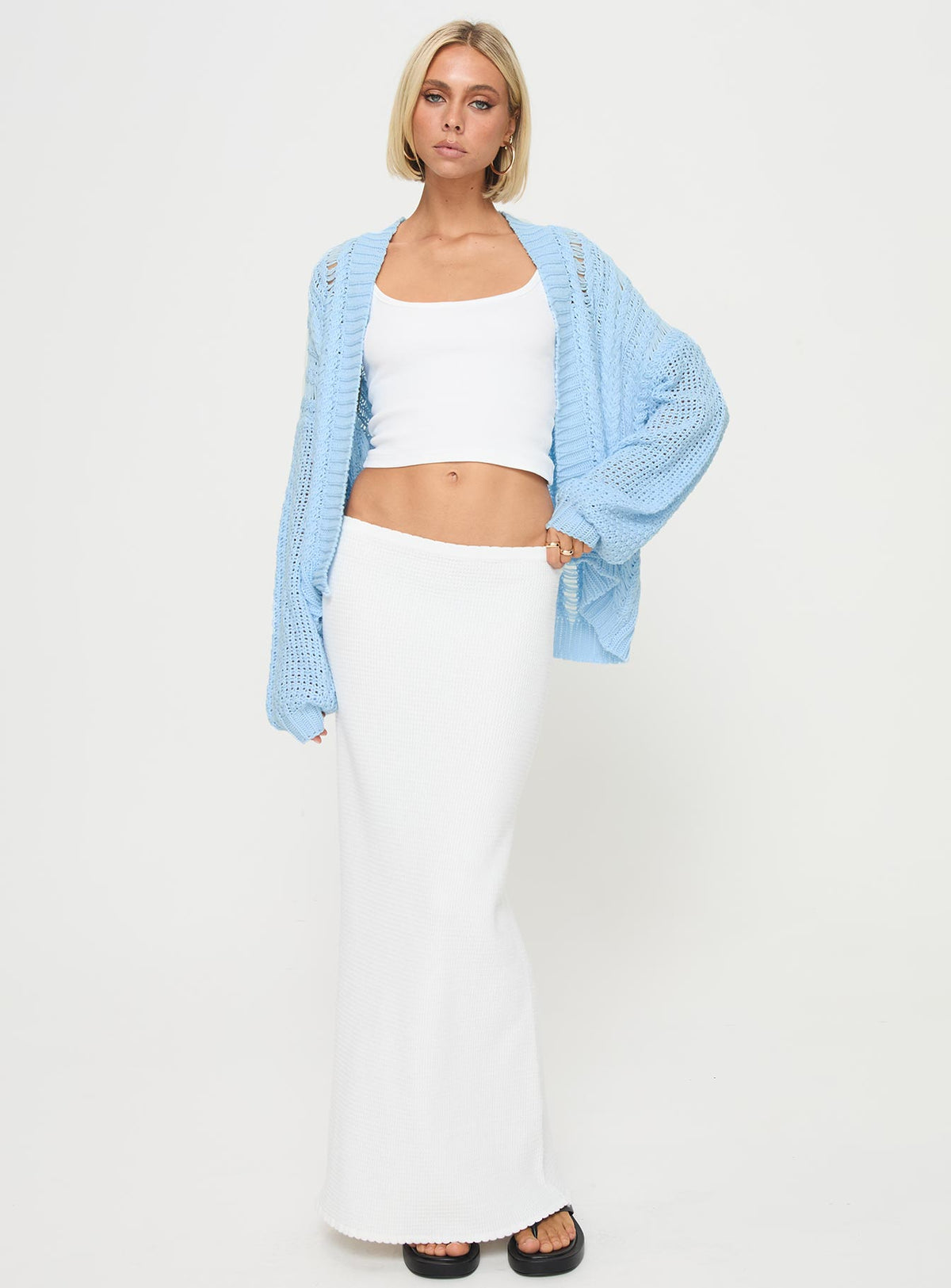 front view of model wearing Princess Polly Abner Cable Cardigan Blue regular Jumpers 
