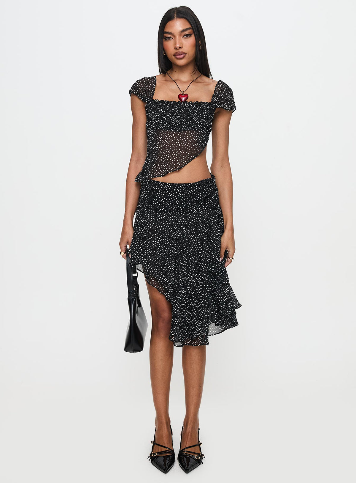   front view of model wearing Princess Polly Legacy Midi Skirt Onyx Polka Skirts 