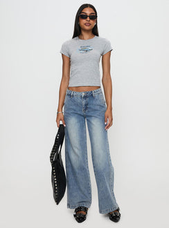 front view of model wearing Princess Polly Skipper Low Rise Wide Leg Jeans Vintage Blue Low Rise Jeans Jeans 