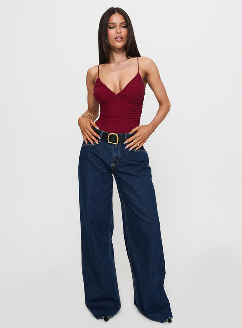 side view of model wearing Princess Polly Merril Bodysuit Maroon Sleeveless Bodysuit 