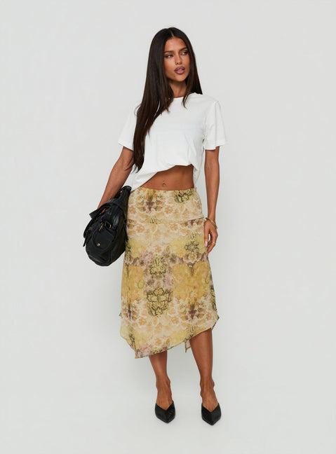 Showcasing the Daphene Asymmetrical Midi Skirt Multi in womens-skirts with relaxed fit, frayed hem, and abstract print front view of model wearing Princess Polly