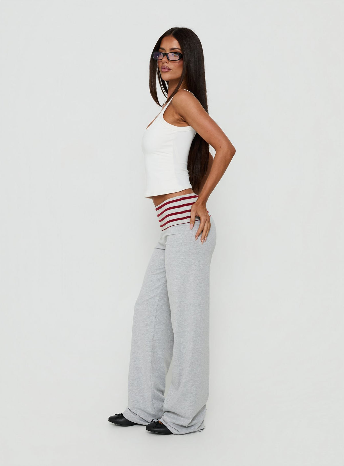 Crafted with Jetset Pants Grey Red Stripe womens regular pants mid-rise striped wide-leg silhouette side view of model wearing Princess Polly