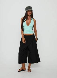 Designed with the Busy Busy Low Baggy Capri Pant Black in womens-regular-pants featuring low-rise detail view of model wearing Princess Polly
