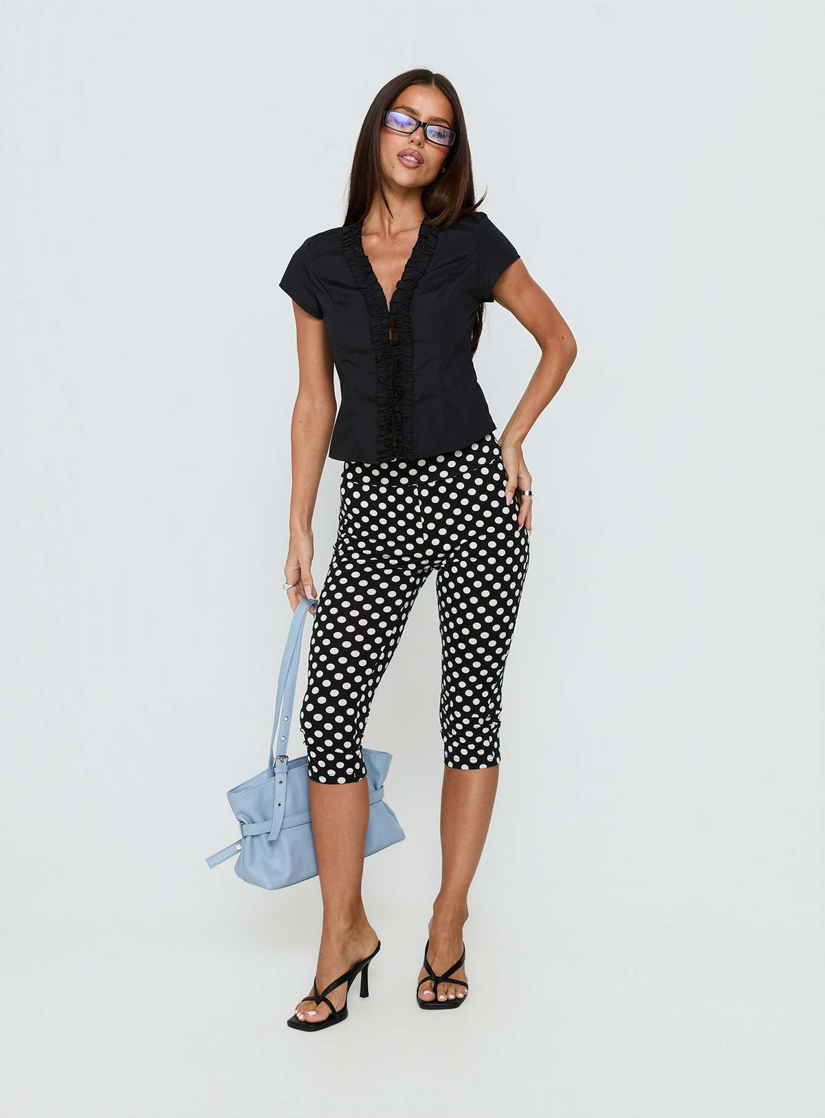 front view of model wearing Princess Polly Isadonna Capri Pants Black Polka Dot Mid Rise Pants Pants 