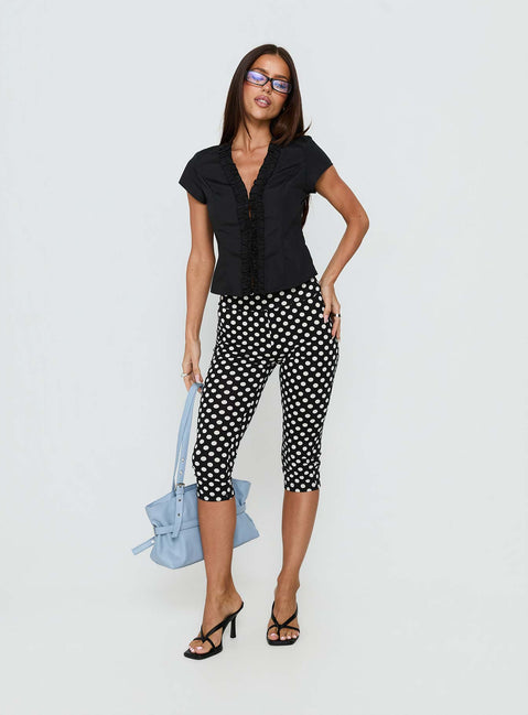 front view of model wearing Princess Polly Isadonna Capri Pants Black Polka Dot Mid Rise Pants Pants 