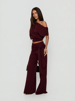 Crafted from Hadlia Tie Waist Pants Burgundy Petite womens-regular-pants in high-rise side view of model wearing