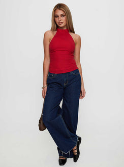 side view of model wearing Princess Polly Merril Halter Top Red Sleeveless High Neck 