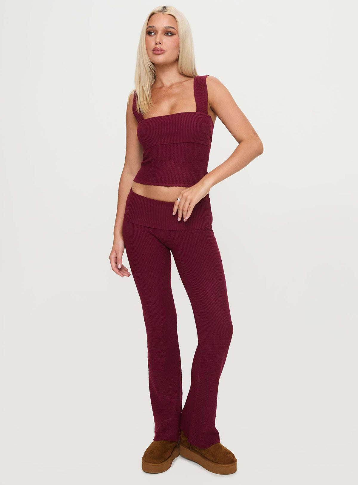 front view of model wearing Princess Polly Closed Eyes Flared Pants Maroon Low Rise Pants Pants 