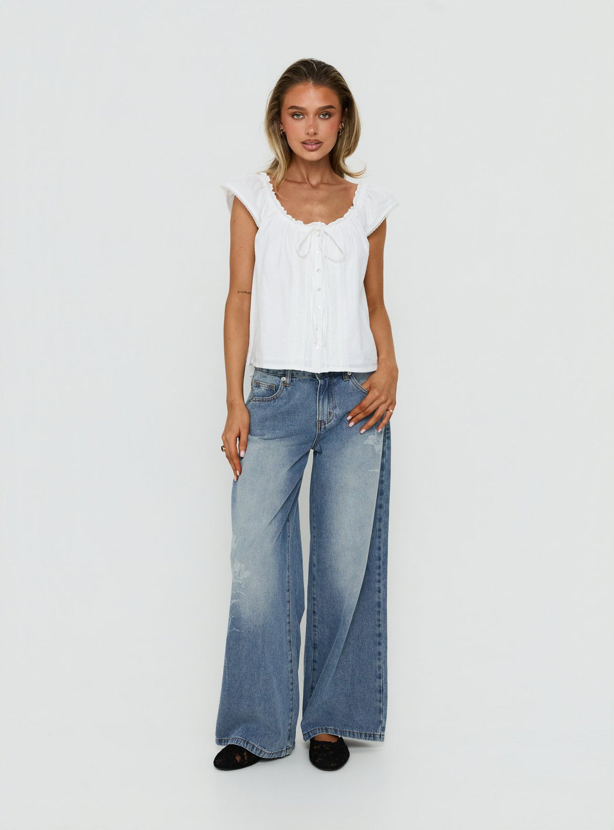 Featuring Johnni Floral Printed Low Rise Jeans Mid Wash womens-jeans with low-rise waist detail Princess Polly