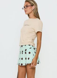  side view of model wearing Princess Polly Elicia Ruched Mini Skirt Mint / Chocolate Polka Dot Mini Skirts Skirts 