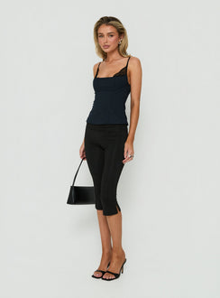 Crafted with Avedon Foldover Waist Capri Pants in Black womens regular pants featuring high-rise side view of model wearing Princess Polly
