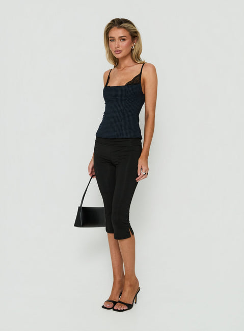 Crafted with Avedon Foldover Waist Capri Pants in Black womens regular pants featuring high-rise side view of model wearing Princess Polly
