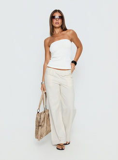 side view of model wearing Princess Polly Around The Clock Button Detail Mid Rise Wide Leg Pants Cream Mid Rise Pants Pants 