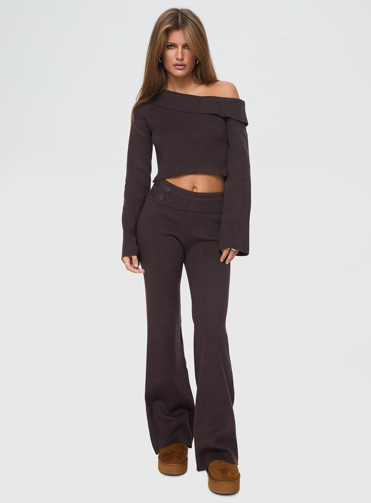 back view of model wearing Princess Polly Sina Off The Shoulder Top Chocolate Full Sleeves Asymmetric Neckline 