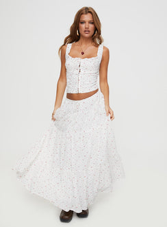   side view of model wearing Princess Polly Cherry On Top Maxi Skirt White Floral Midi Skirts Skirts 