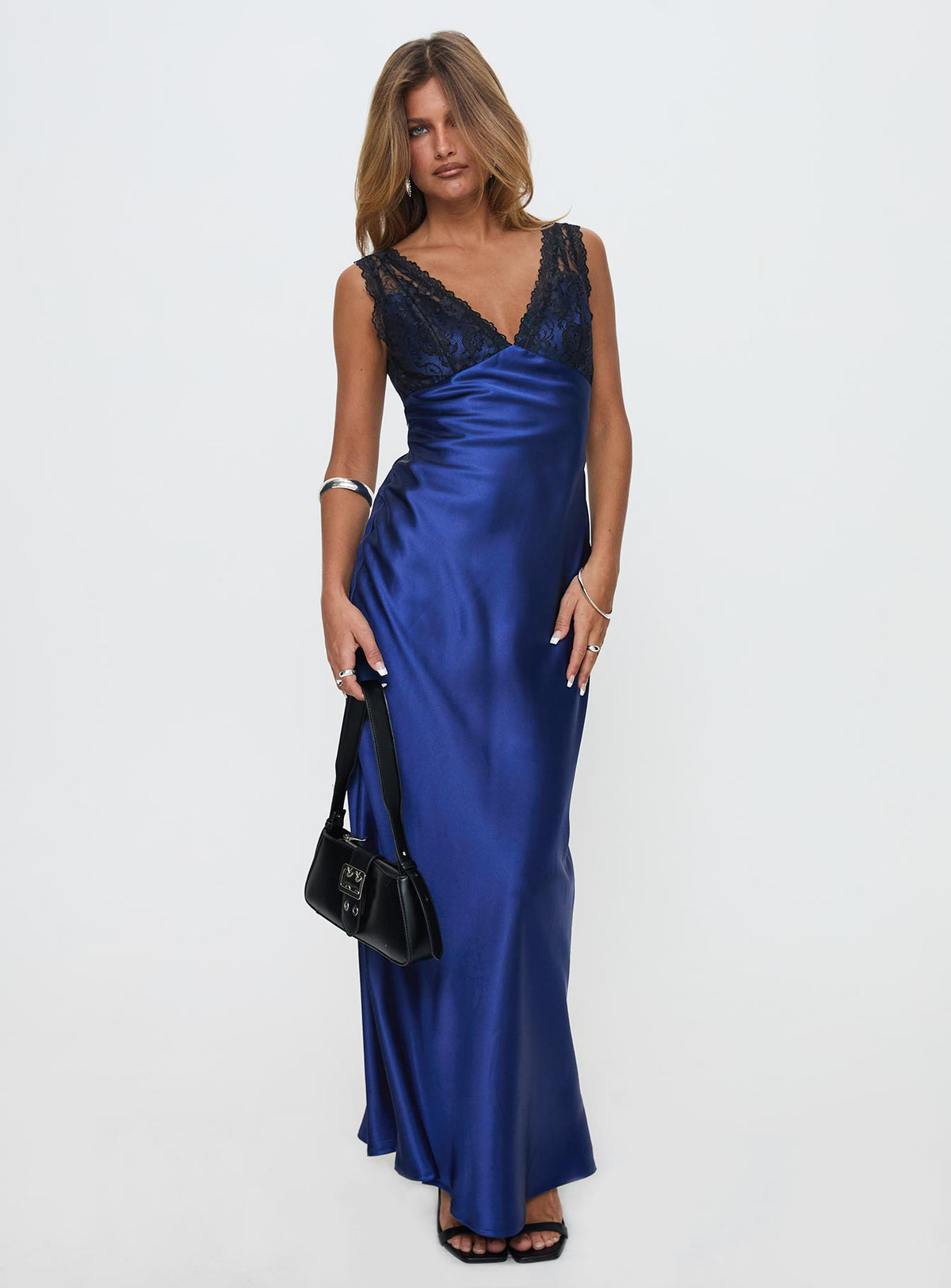 side view of model wearing Princess Polly Voila Lace Maxi Dress Navy / Black V-Neck 
