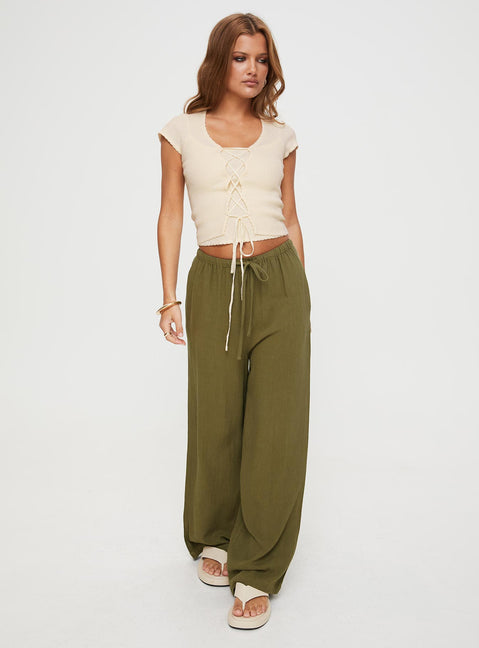 front view of model wearing Princess Polly Parklea Pants Sage Mid Rise Pants Pants 