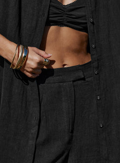Front view of model wearing  front Princess Polly Low Rise Pants  Zenia Linen Blend Pants Black