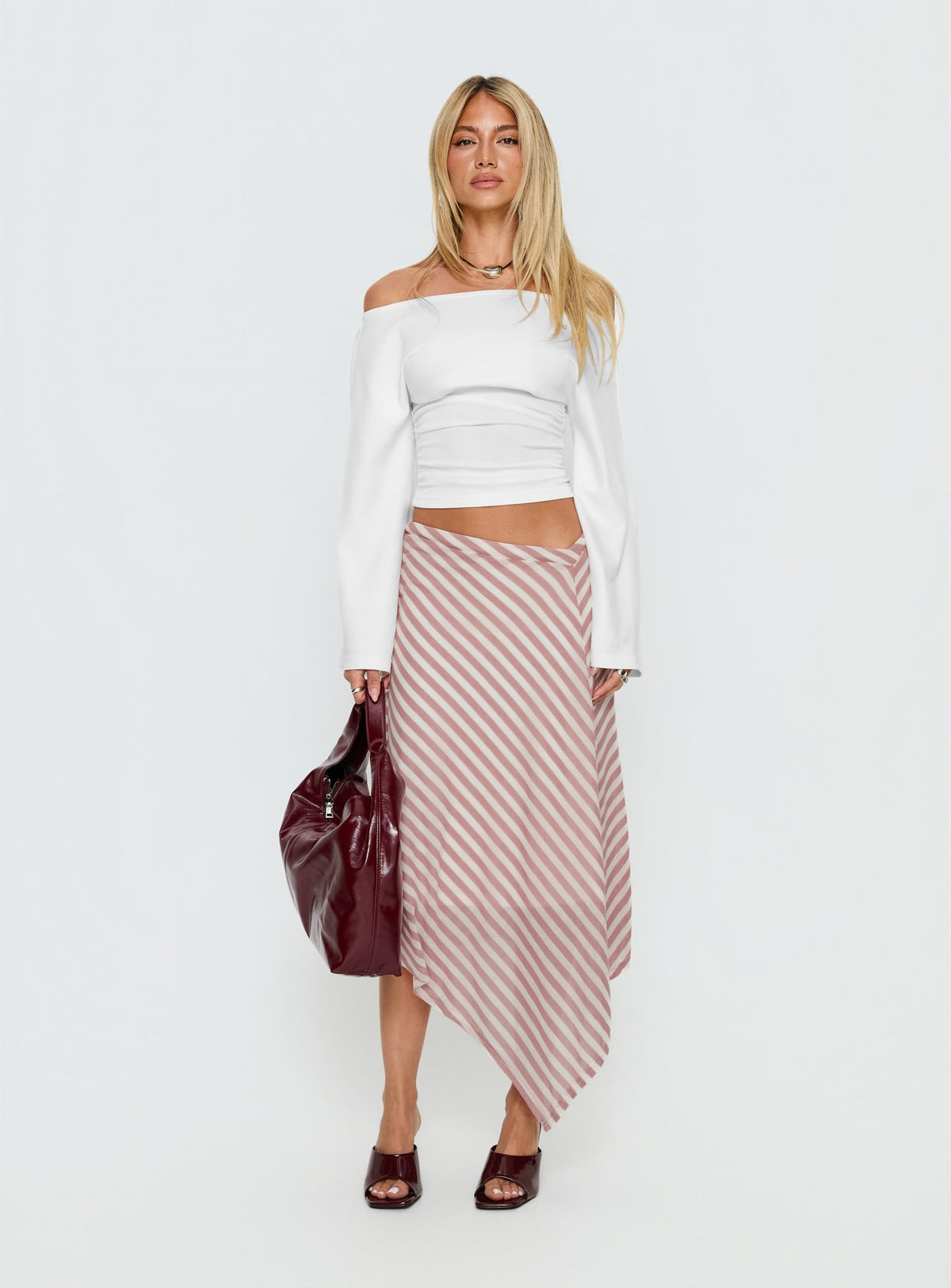   front view of model wearing Princess Polly Gwenora Asymmetrical Midi Skirt Pink Stripe Midi Skirts Skirts 