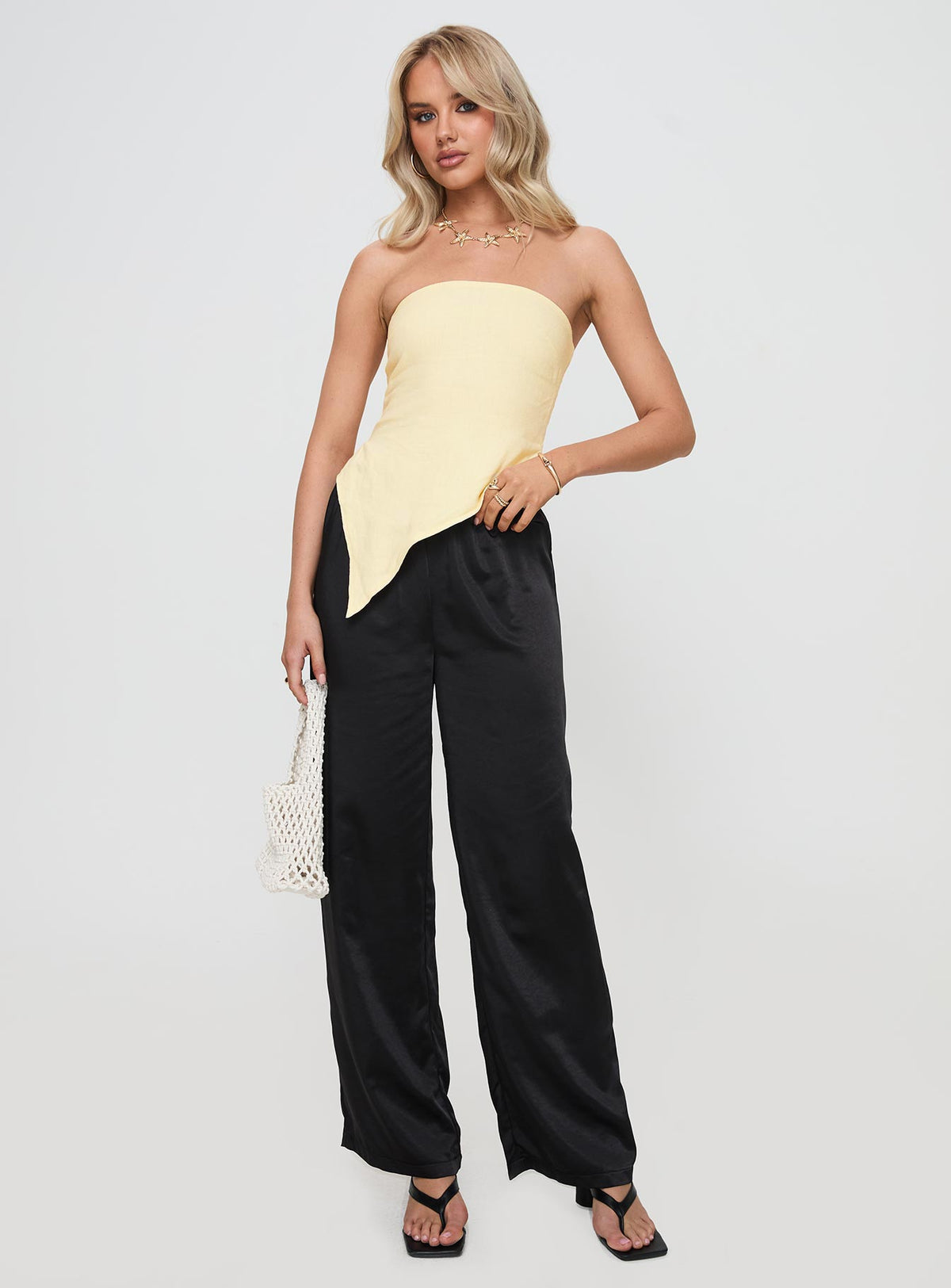 front view of model wearing Princess Polly Birdie Asymmetric Linen Blend Top Lemon Sleeveless straight 
