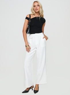 side view of model wearing Princess Polly Jazzar Pocket Detail Pleated Pant White Petite High Rise Pants Pants 