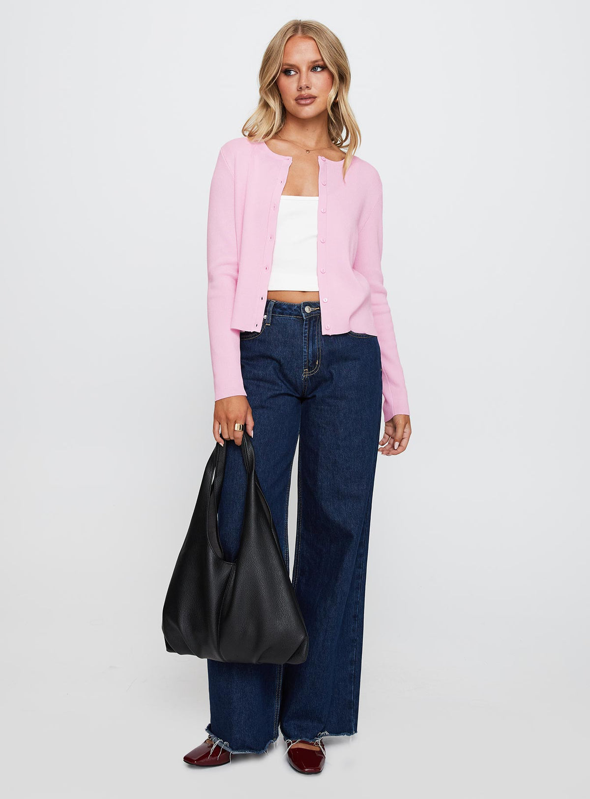 back view of model wearing Princess Polly Old Burlington Knit Cardigan Pink Cropped Jumpers Jumpers 