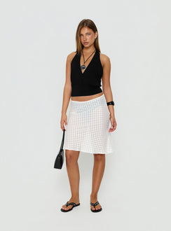 Showcasing the Evangela Sheer Midi Skirt White Polka Dot womens-skirts with midi length front view of model wearing Princess Polly