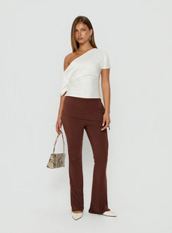 Crafted from sienna fabric the Masimo Layered Pants Chocolate womens regular pants feature high-rise and wide-leg styling side view of model wearing Princess Polly