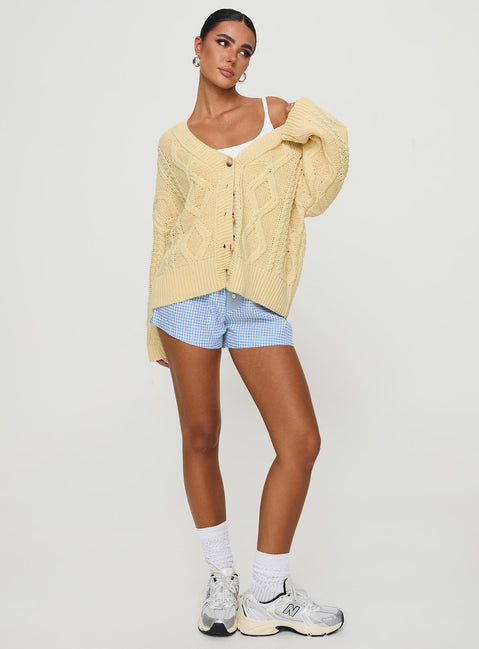 side view of model wearing Princess Polly Daxtan Cable Cardigan Lemon Cropped Jumpers Jumpers 