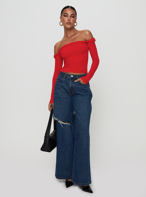 front view of model wearing Princess Polly Naylor Rip Mid Rise Wide Leg Jeans Dark Blue Wash Mid Rise Jeans Jeans 
