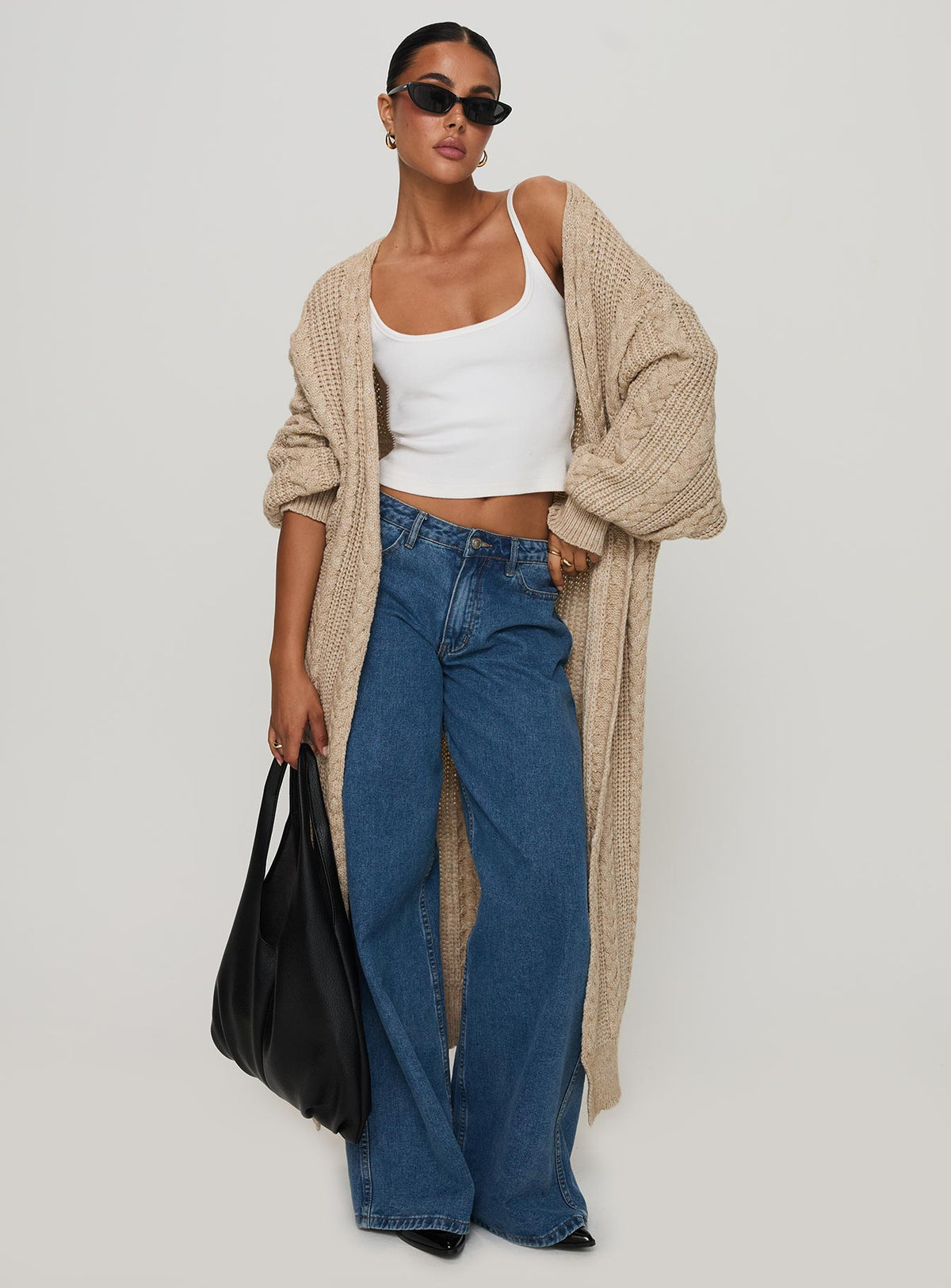 front view of model wearing Princess Polly Orkid Cable Knit Cardigan Beige Longline Jumpers Jumpers 
