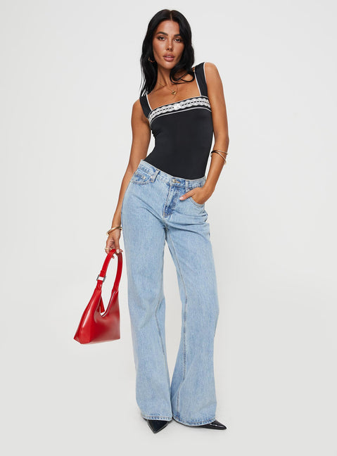 front view of model wearing Princess Polly Keating Bodysuit Black Tall Sleeveless Bodysuit 