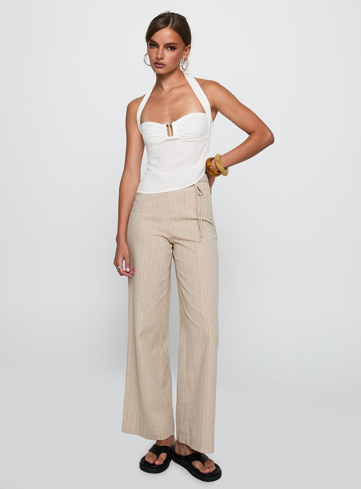 side view of model wearing Princess Polly Isabetta Halter Top White Sleeveless Sweetheart 