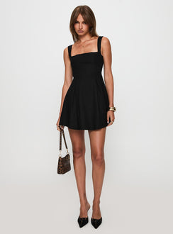 front view of model wearing Princess Polly Xanthus Mini Dress Black Square Neck 