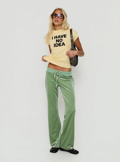 Showcasing the Alba Track Pant Sage in womens-regular-pants with mid-rise front view of model wearing Princess Polly