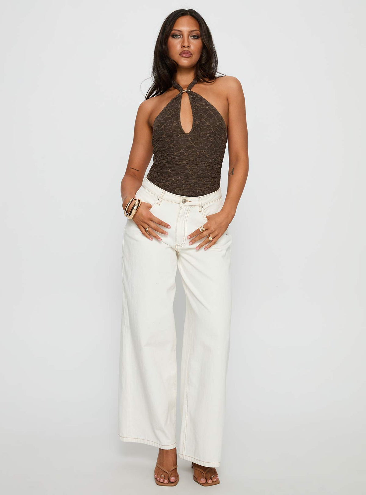 front view of model wearing Princess Polly Libbey Hardware Detail Textured Bodysuit Brown Sleeveless Bodysuit 