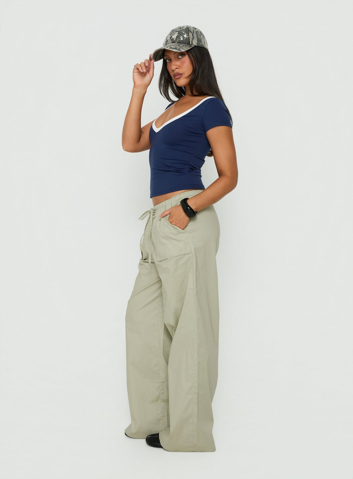 Crafted from the Toren Drawstring Straight Leg Pants Stone womens-regular-pants with mid-rise side view of model wearing Princess Polly