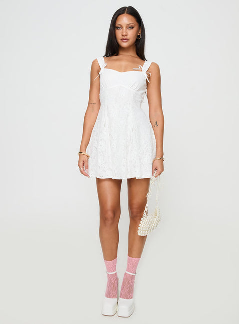 front view of model wearing Princess Polly Tadea Mini Dress White Sweetheart Neckline 