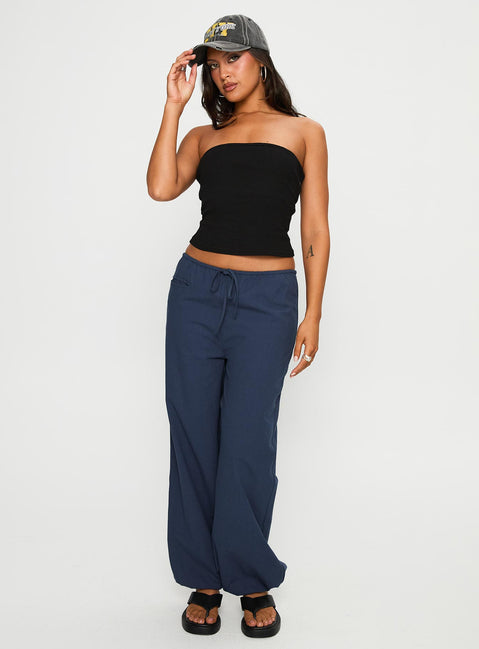 side view of model wearing Princess Polly Zodie Low Waist Pants Navy Low Rise Pants Pants 