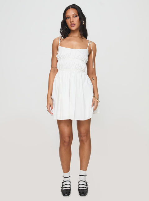 side view of model wearing Princess Polly Jacksonne Mini Dress White Scoop Neck 