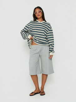 Showcasing the Opollo V Neck Jumper Blue Multi Stripe womens-jumpers with short length front view of model wearing Princess Polly